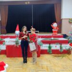 Podziękowanie i wręczenie kwiatów i upominku